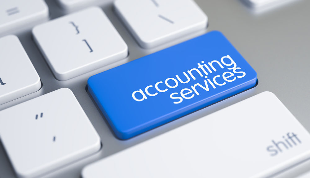 Accounting Services Key on the Metallic Keyboard. Slim Aluminum Keyboard Button Showing the Inscription Accounting Services.
